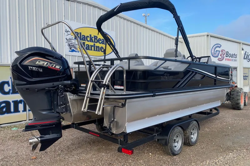 Slide: The Image of 2026 SunCatcher Fusion 322SS pontoon boat with Yamaha engine at BlackBeard Marine dealership. - 5