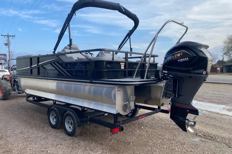 Slide: The Image of 2026 SunCatcher Fusion 322SS pontoon boat with Yamaha outboard motor on trailer. - 4