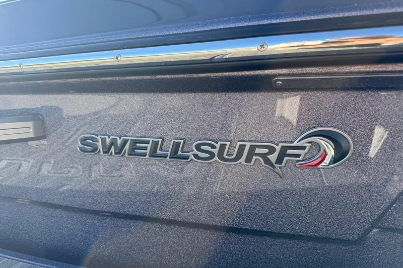 Slide: The Image of 2026 Supra SL 550 with SwellSurf logo on metallic surface. - 11