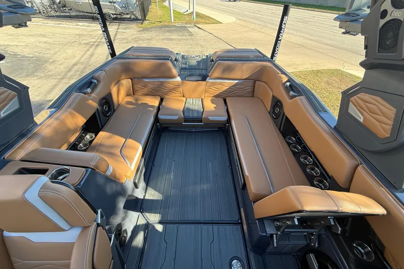 Slide: The Image of 2026 Supra SL 550 boat interior with luxurious tan leather seating and modern design. - 23