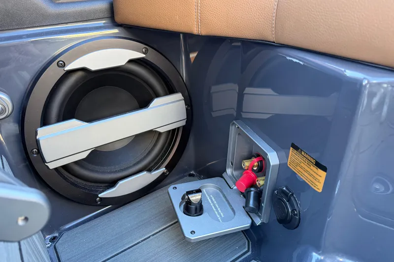 Slide: The Image of 2026 Supra SL 550 audio system with subwoofer and power connections. - 34