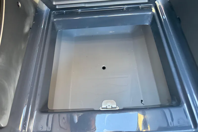 Slide: The Image of Empty storage compartment in a 2026 Supra SL 550 vehicle. - 51