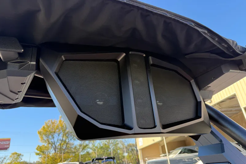 Slide: The Image of 2026 Supra SL 550 boat speakers under canopy, clear blue sky background. - 58