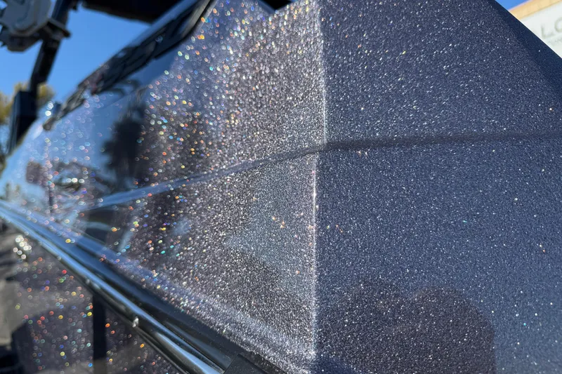 Slide: The Image of Close-up of 2026 Supra SL 550 with sparkling metallic paint finish. - 64