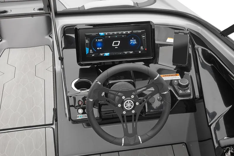 Slide: The Image of Manufacturer Provided Image: 2026 Yamaha Boats 252XE dashboard with steering wheel and digital display. - 6
