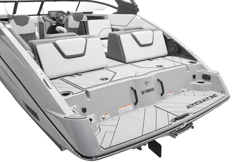 Slide: The Image of Manufacturer Provided Image: 2026 Yamaha Boats 252XE, sleek design, spacious seating, modern interior, rear view. - 9