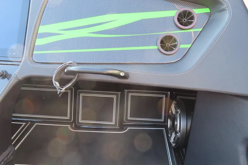 Slide: The Image of Interior of 2023 MTI 390X with green accents and modern speaker design. - 23