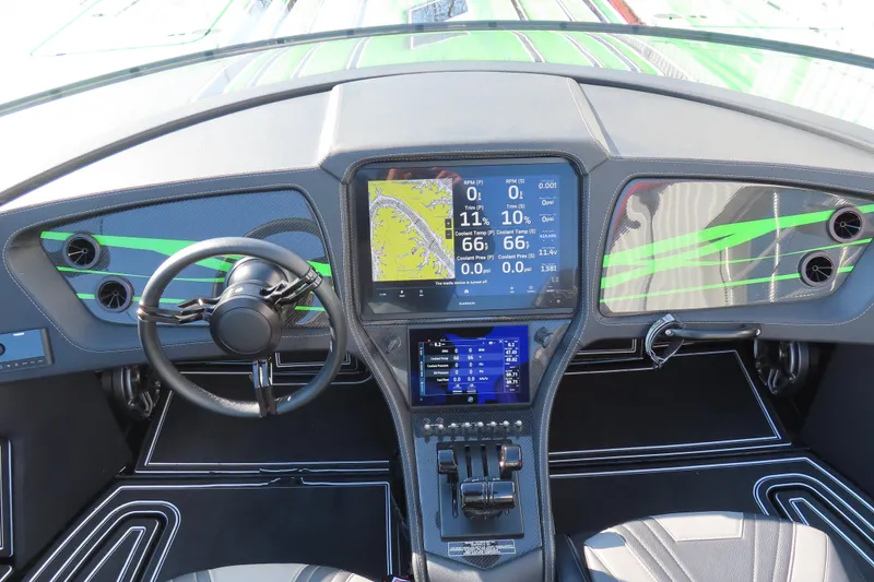 Slide: The Image of Dashboard of 2023 MTI 390X boat with advanced navigation and control systems. - 26
