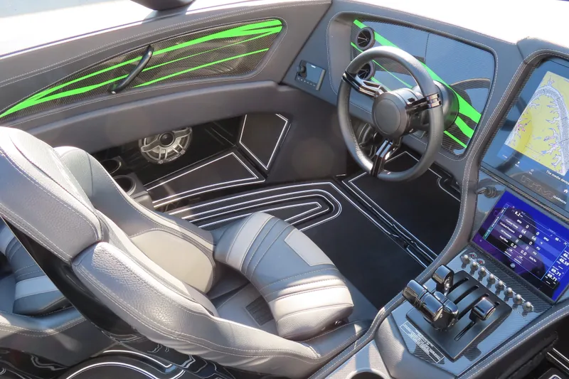 Slide: The Image of Interior of 2023 MTI 390X boat with modern steering and navigation system. - 27
