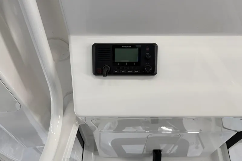 Slide: The Image of 2024 Regulator 34 boat interior with Garmin marine radio installed. - 28