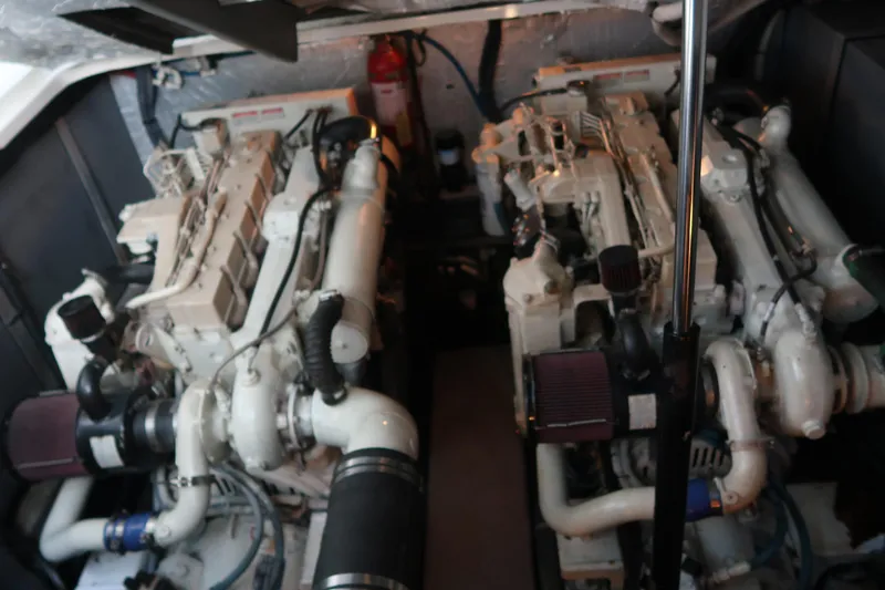 Slide: The Image of Engine room of a 2002 Sea Ray 410 Sundancer with dual engines. - 41