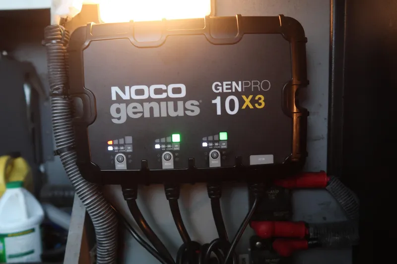 Slide: The Image of NOCO Genius GENPRO 10X3 battery charger installed on 2002 Sea Ray 410 Sundancer. - 47