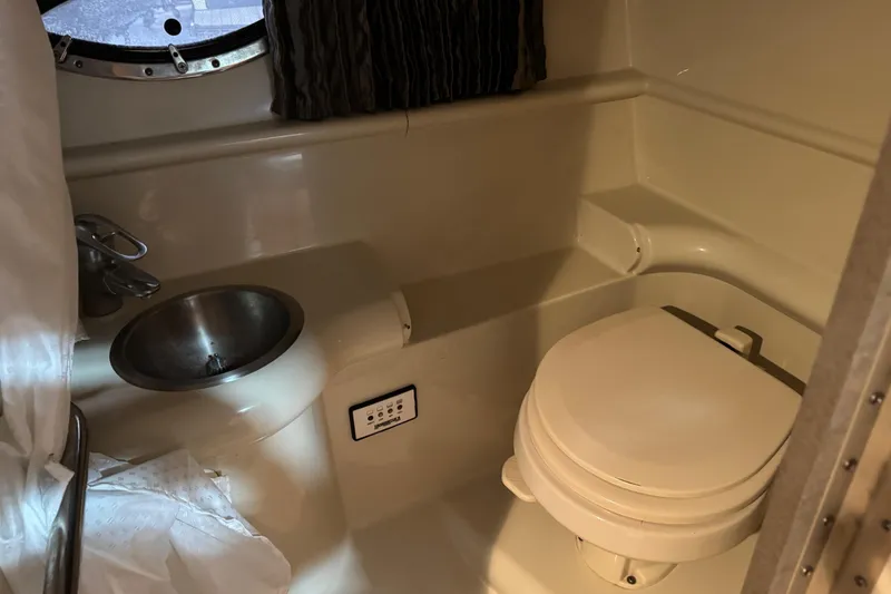 Slide: The Image of 2005 Formula 330 Sun Sport boat bathroom with sink and toilet. - 14