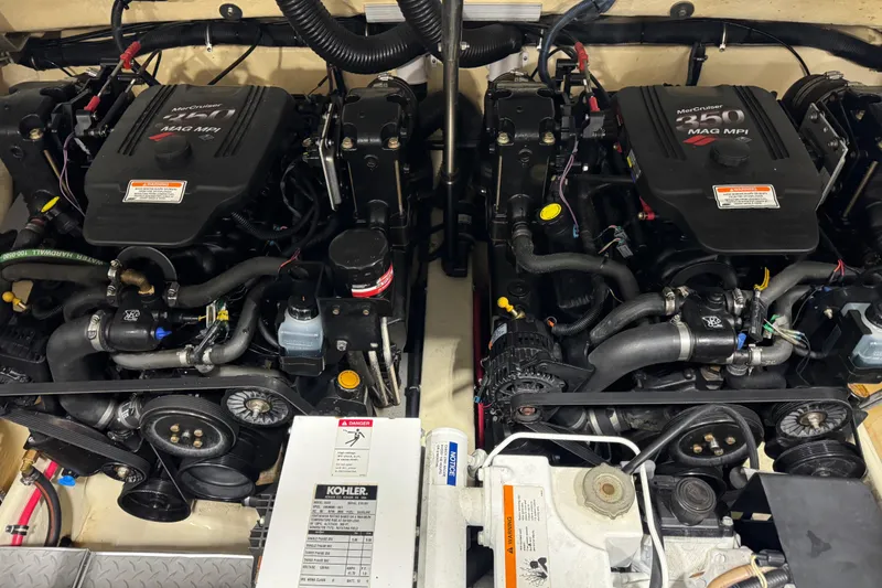 Slide: The Image of Twin MerCruiser engines in a 2005 Formula 330 Sun Sport boat. - 16