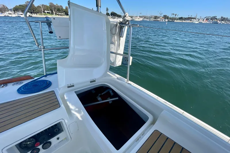 Slide: The Image of Open hatch on 2003 Beneteau First 47.7 sailboat, docked in a marina. - 20