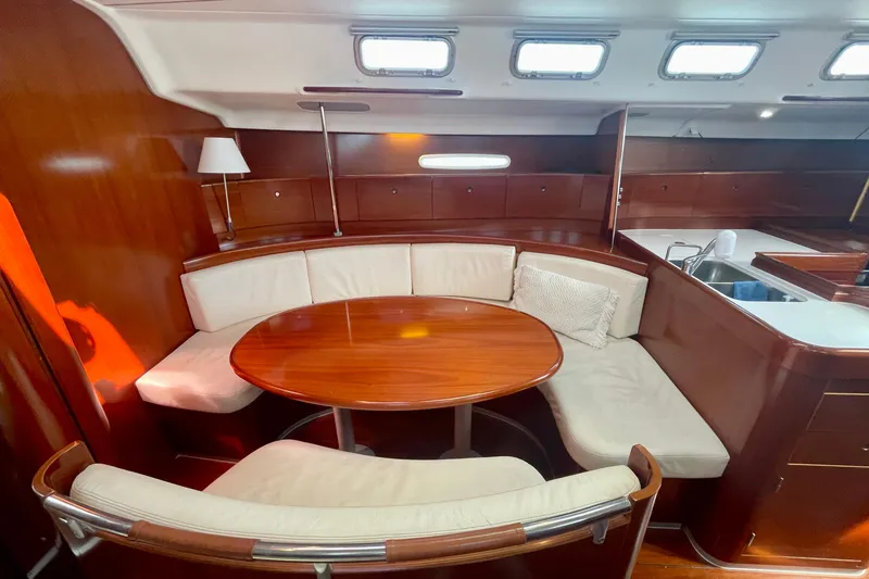 Slide: The Image of Luxurious interior of 2003 Beneteau First 47.7 yacht with elegant wood and leather seating. - 26