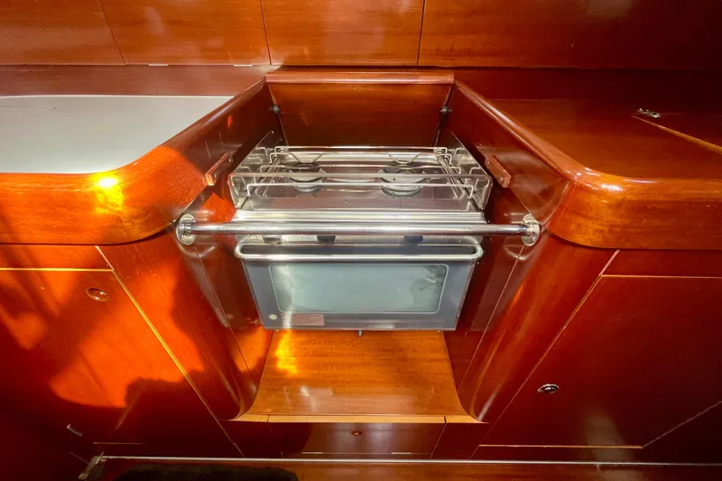 Slide: The Image of Luxurious wooden kitchen interior on a 2003 Beneteau First 47.7 yacht. - 34