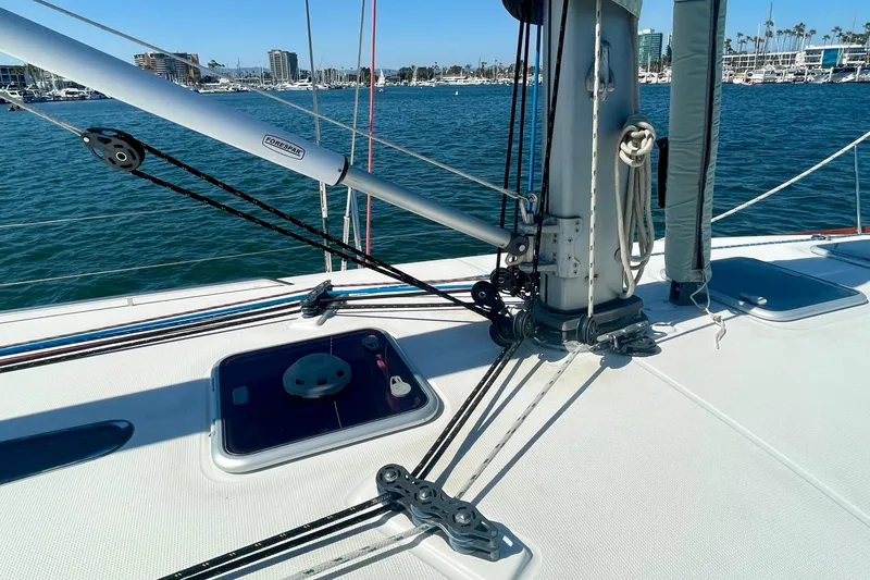 Slide: The Image of Deck view of 2003 Beneteau First 47.7 sailboat, showcasing rigging and hatch. - 9