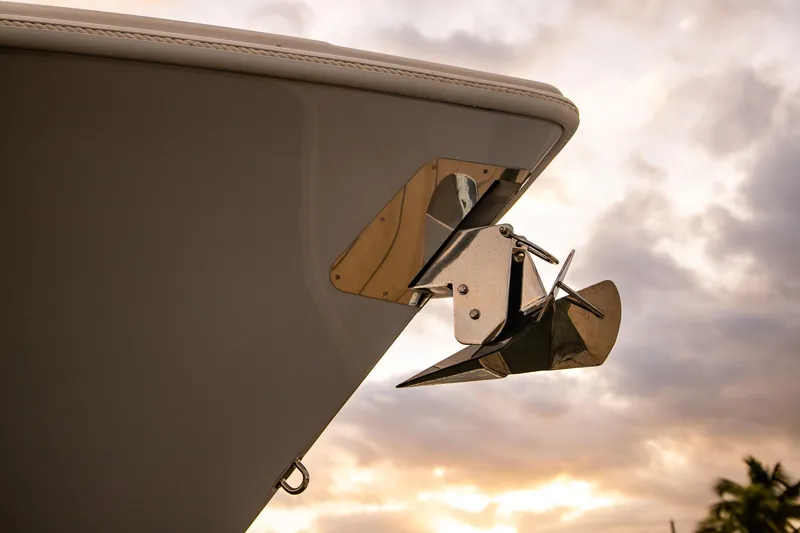 Slide: The Image of Close-up of 2026 Yellowfin 36 Offshore boat anchor against a cloudy sky. - 112