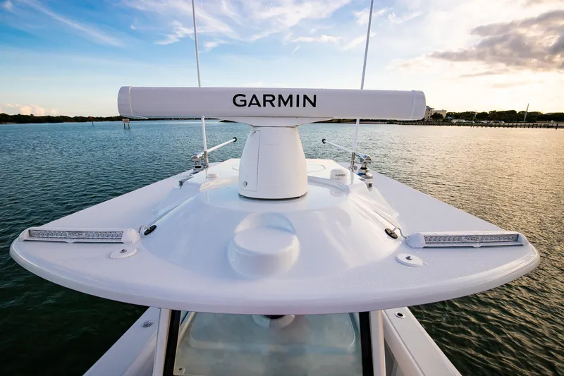 Slide: The Image of 2026 Yellowfin 36 Offshore boat with Garmin radar on calm water. - 116