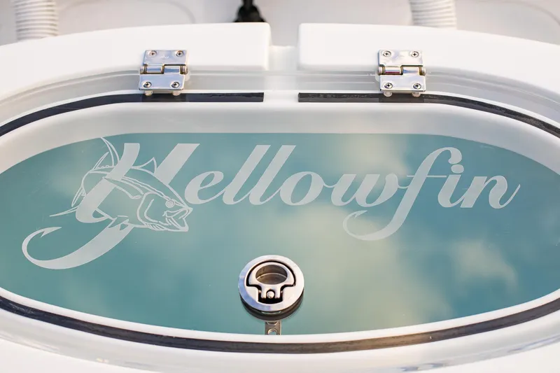 Slide: The Image of 2026 Yellowfin 36 Offshore boat logo on a sleek, modern surface. - 118