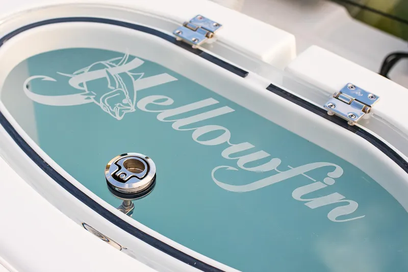 Slide: The Image of 2026 Yellowfin 36 Offshore boat logo on a sleek, modern hatch cover. - 119