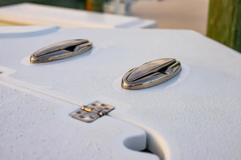 Slide: The Image of Stainless steel latches on 2026 Yellowfin 36 Offshore boat deck. - 137