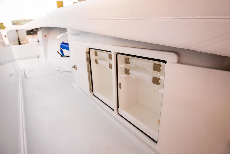 Slide: The Image of 2026 Yellowfin 36 Offshore boat interior storage compartments. - 143