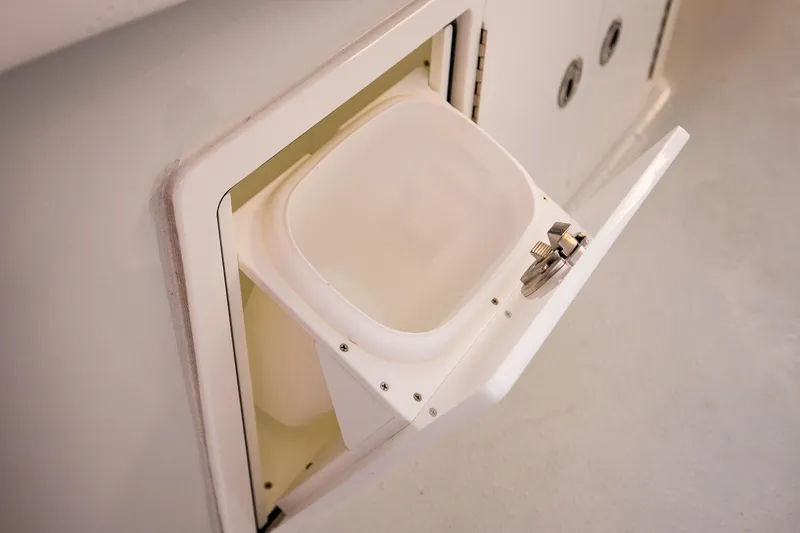 Slide: The Image of Built-in storage compartment on 2026 Yellowfin 36 Offshore boat. - 144