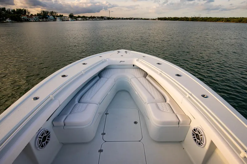 Slide: The Image of 2026 Yellowfin 36 Offshore boat with spacious seating on calm water. - 154