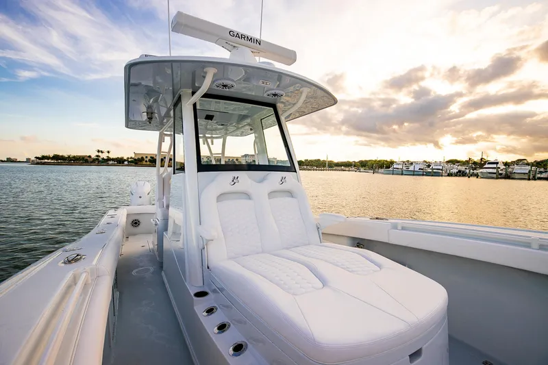 Slide: The Image of 2026 Yellowfin 36 Offshore boat on calm water at sunset. - 158