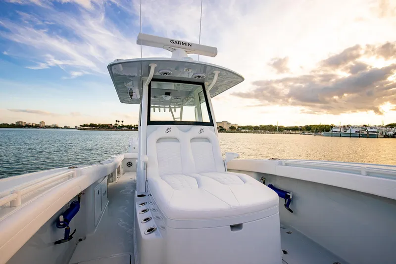 Slide: The Image of 2026 Yellowfin 36 Offshore boat on calm water at sunset. - 159