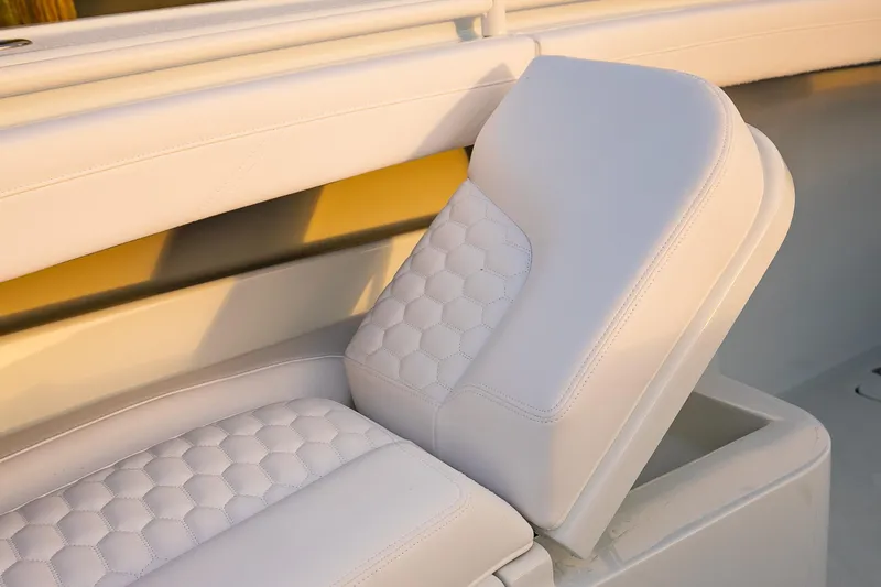 Slide: The Image of 2026 Yellowfin 36 Offshore boat seat with white quilted upholstery. - 167