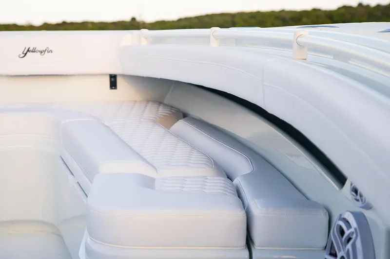 Slide: The Image of Luxurious seating on 2026 Yellowfin 36 Offshore boat, featuring elegant white upholstery. - 171