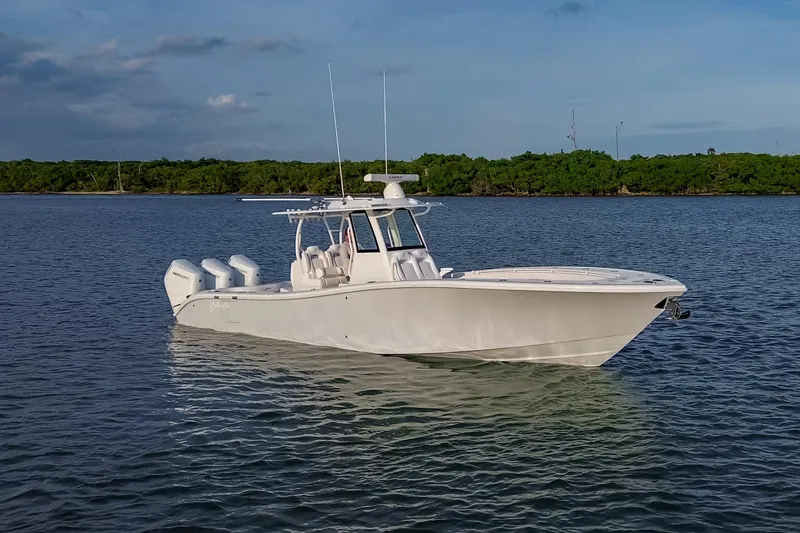 Slide: The Image of 2026 Yellowfin 36 Offshore boat cruising on calm waters. - 2
