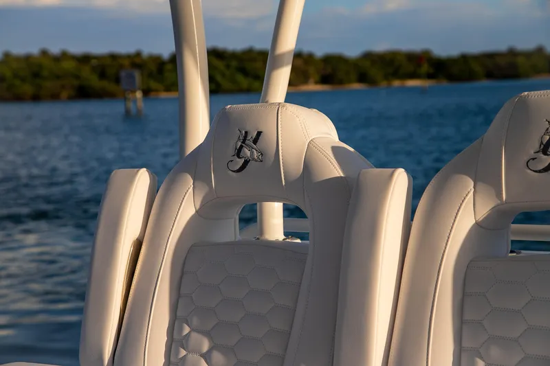 Slide: The Image of Luxury seating on 2026 Yellowfin 36 Offshore boat with scenic water backdrop. - 42