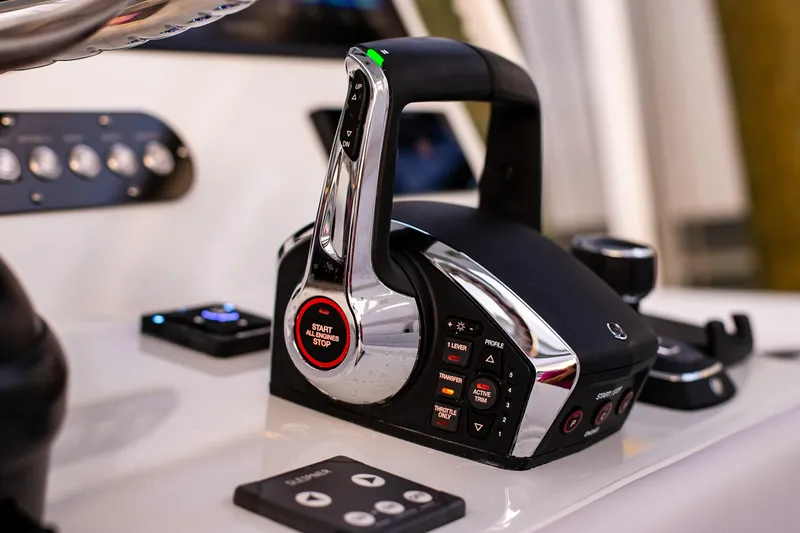 Slide: The Image of Control panel of 2026 Yellowfin 36 Offshore boat, featuring advanced throttle system. - 74