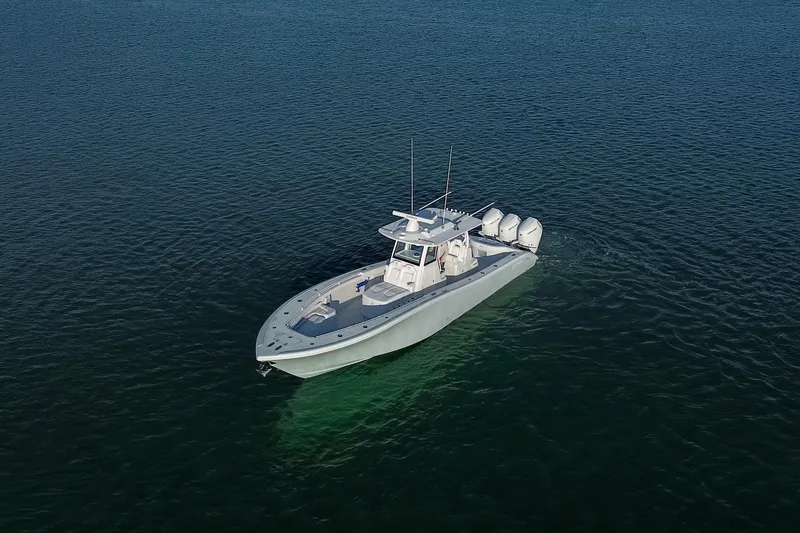 Slide: The Image of 2026 Yellowfin 36 Offshore boat cruising on open water. - 93