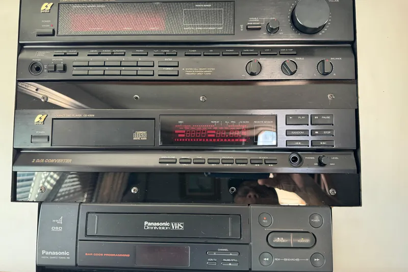 Slide: The Image of Vintage audio system with Panasonic VHS player in a 1990 Sea Ray 380 Aft Cabin. - 23
