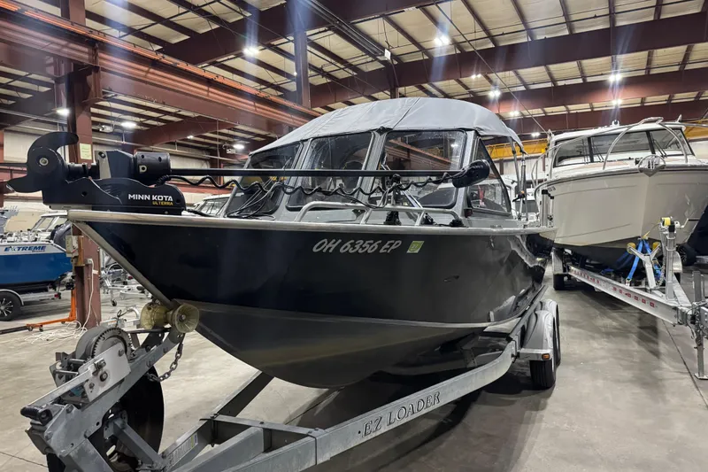 Slide: The Image of 2008 North River 21 SEAHAWK boat on trailer in indoor storage facility. - 11