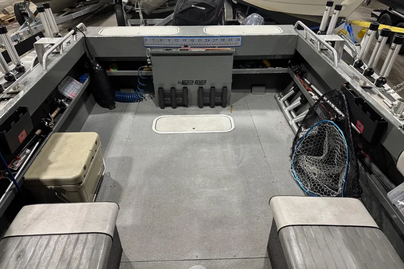 Slide: The Image of 2008 North River 21 SEAHAWK boat interior with fishing gear and seating. - 20