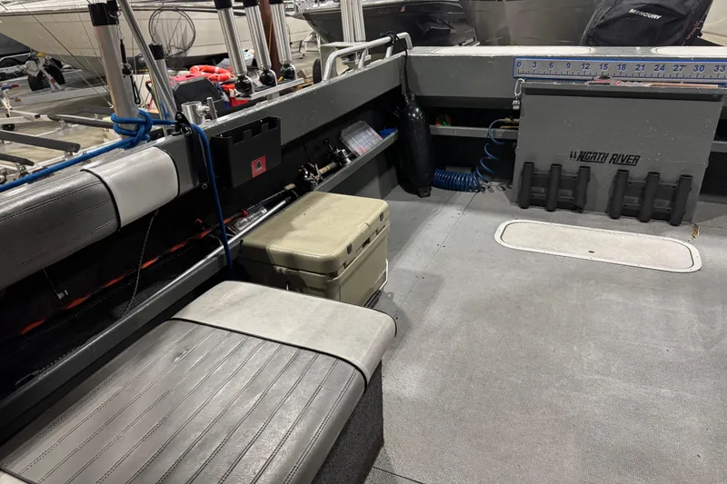 Slide: The Image of Interior of a 2008 North River 21 SEAHAWK boat with seating and storage. - 22