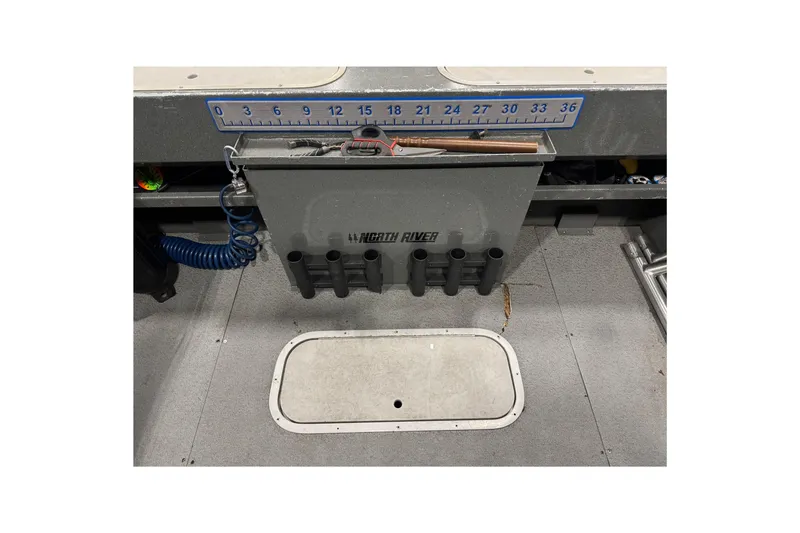 Slide: The Image of Interior of 2008 North River 21 SEAHAWK boat with storage and measuring tools. - 23