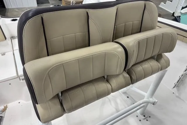 Slide: The Image of Yamaha Boats 2021 255 FSH Sport E, beige seating, marine upholstery, interior view. - 13