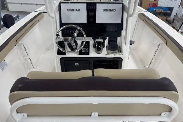 Slide: The Image of 2021 Yamaha Boats 255 FSH Sport E dashboard with Simrad displays and dual seating. - 3
