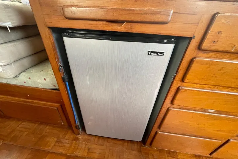Slide: The Image of Magic Chef fridge in 1991 Marine Trader 34 Double Cabin boat interior. - 23