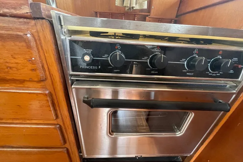 Slide: The Image of Stainless steel oven in 1991 Marine Trader 34 Double Cabin yacht kitchen. - 24