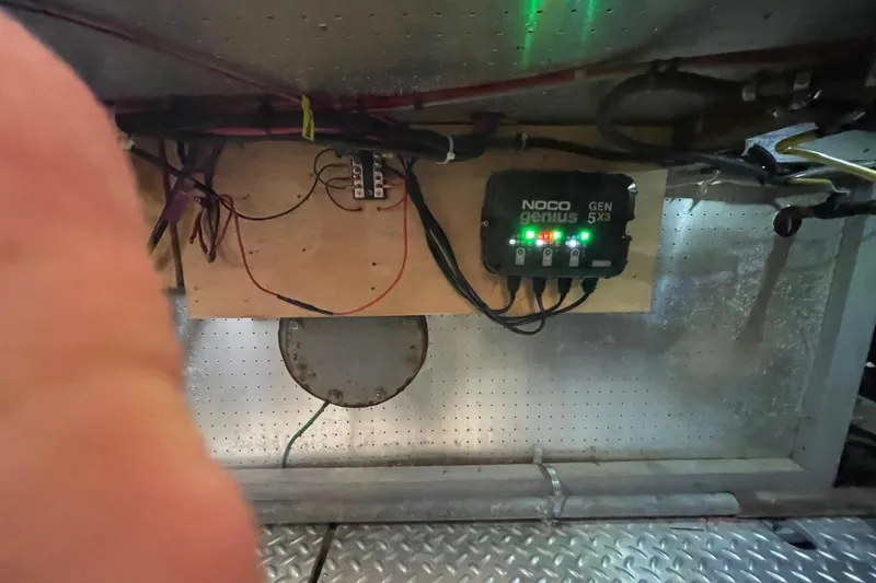 Slide: The Image of NOCO Genius GEN 5X3 charger in 1991 Marine Trader 34 Double Cabin engine room. - 47