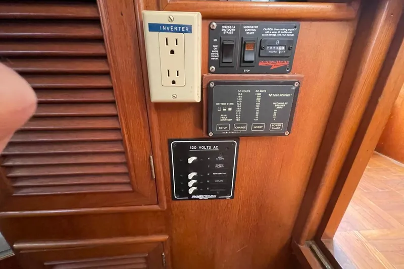 Slide: The Image of Electrical control panel on a 1991 Marine Trader 34 Double Cabin boat. - 7