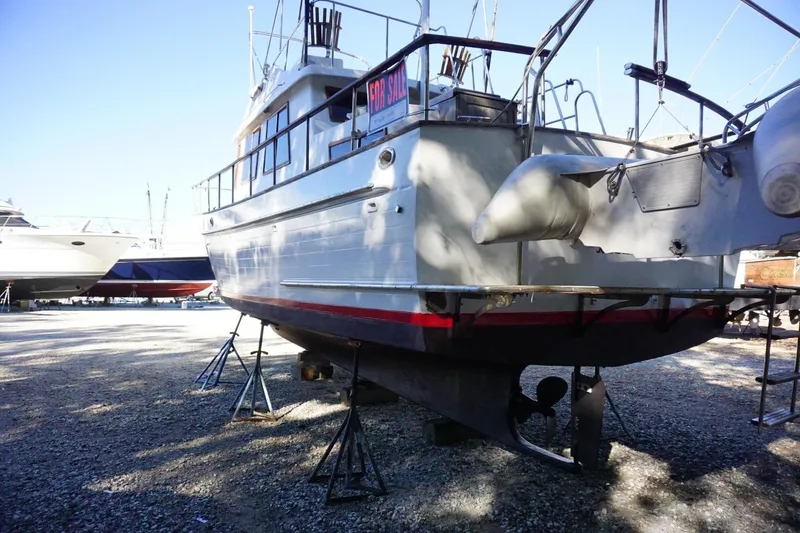 Slide: The Image of 1991 Marine Trader 34 Double Cabin boat on stands, for sale. - 76